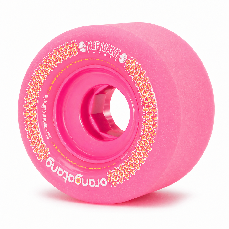 Orangatang 73mm Beefcake (83a, pink) longboard skateboard wheel (hero)